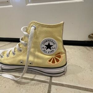 Converse Yellow High-Top Sneakers with Sun Design